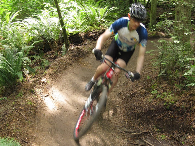 mountain biker rounding the bend in Seattle